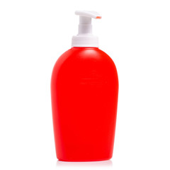 Red bottle with soap dispenser on white background isolation