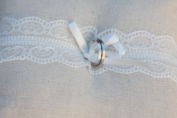 Wedding rings on a cushion for ring