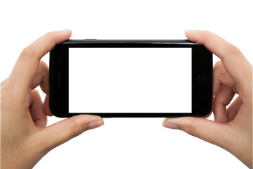 Handy in der Hand vor weißem Hintergrund