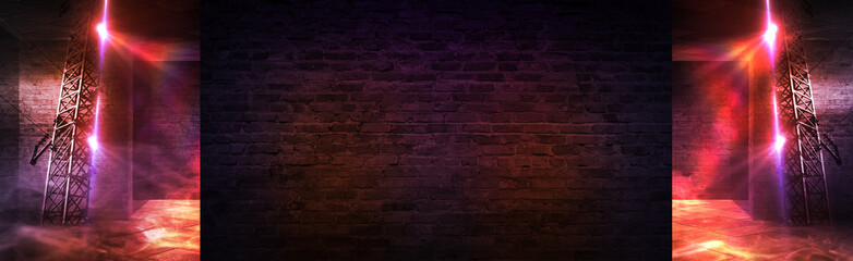 Empty brick wall background with neon lights, spotlights.