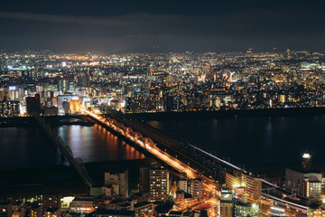 Fototapeta na wymiar Osaka urban cityscape landscape background at twilight night