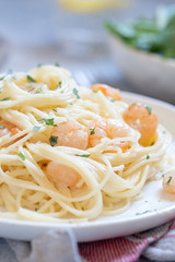 spaghetti with shrimps and creamy sauce