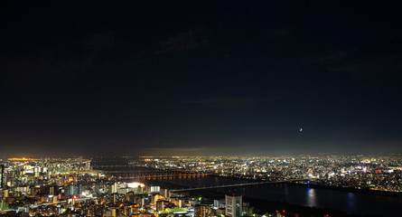 Fototapeta na wymiar Osaka urban cityscape landscape background at twilight night