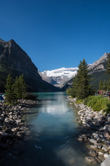 Mid Morning at Lake Louise in Banff National Park in the Canadian Rockies - Alberta Canada. Teal color to the water