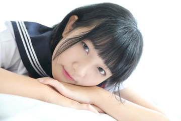 Obraz premium Portrait japanese school girl in white tone bed room