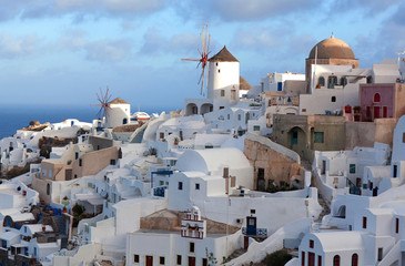 Panoramic view of Oia town at sunset, Santorini island, Cyclades, Greece