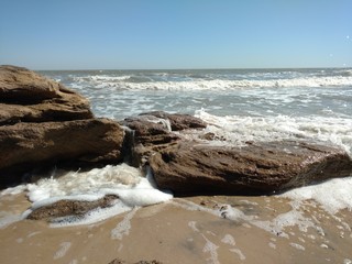 waves crashing on rocks