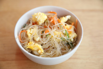 Vermicelli salad japanese style on wood background
