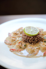 Grilled prawns shrimps with garlic, lemon and spices with rice