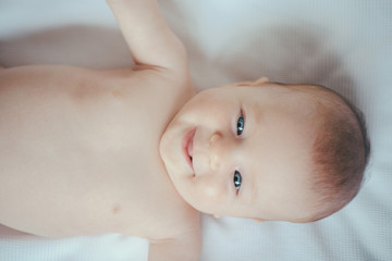 Newborn baby in sling. Happy newborn. Mothers care for happy baby. Baby carrier or sling....