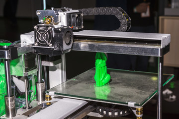 Electronic three dimensional plastic printer during work , 3D printer.