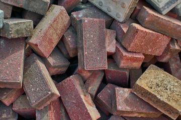 Heap of red bricks, background, pattern