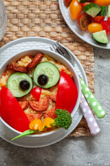 Funny owl mashed potato carrot vegetable puree with sausage