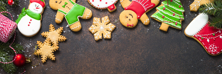 Christmas gingerbread with christmas decorations on dark  backgr
