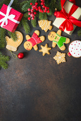 Christmas gingerbread with christmas decorations on dark  backgr