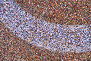 Texture of gravel, fine stone wich metal strips, texture