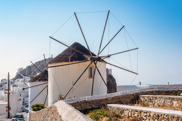 Picturesque windmills in Ano Chora on the island of Serifos. Greece © vivoo