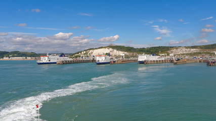 Fototapeta premium Three ferries at the port of Dover on a sunny day.