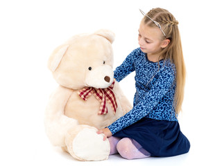 Little girl with teddy bear