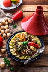 Moroccan fish tajine with chermoula, red peppers and potato