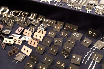 Handmade crystal market, jewelry made of silver, steel, natural stones, beads