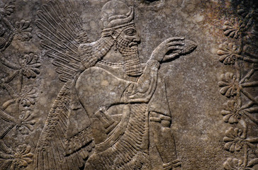 Winged Genie panel, made from alabaster circa 883–859 BCE, decorated an Neo-Assyrian royal palace...