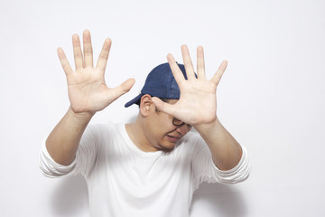 Crying Sad Young Man Showing Surrender Gesture