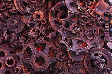 Steampunk background, machine parts, large gears and chains from machines and tractors.
