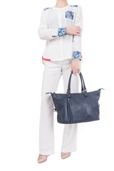  woman with blue handbag in hands. Isolated white background.