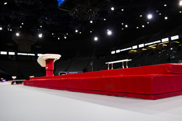 A vaulting horse in a gymnastic arena 