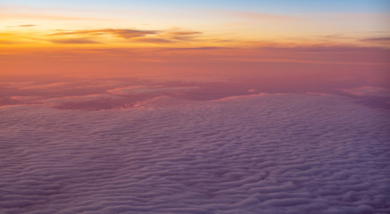 Fototapeta na wymiar Sunrise above the clouds
