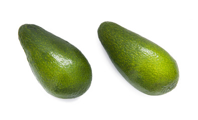 Two fresh avocado isolated on white background