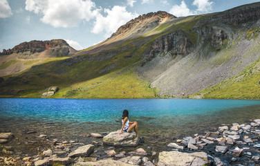 Fototapeta na wymiar Colorado Lake Woman Landscape Blue