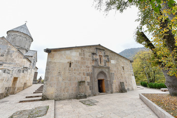 Fototapeta na wymiar Beautiful Armenian monastery Haghartsin in the autumn forest.