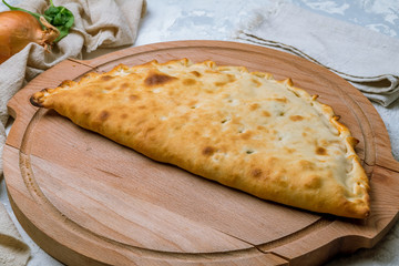 Closed calzone pizza