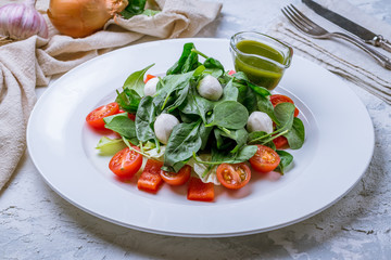 Caprese salad with mozzarella and tomato
