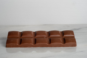 closeup of a chocolate bar isolated on white background