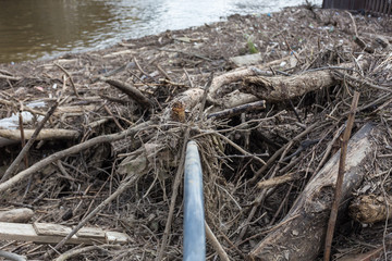 Wood and debris remain from flooding