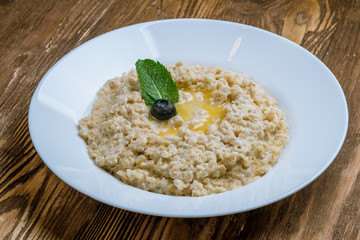oatmeal porridge on white plate