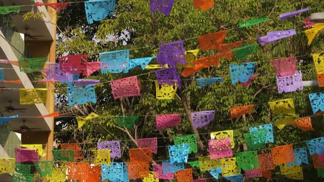 Slow motion of fiesta flags in Mexico