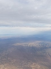 Aerial View of Mountains Sunshine through Clouds
