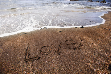 love written in sand