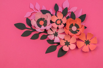 Flower and leaves of paper pink background