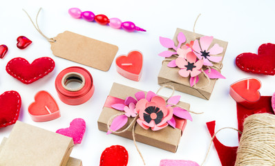 Fototapeta na wymiar Gift wrapping for Valentine's day. Paper craft