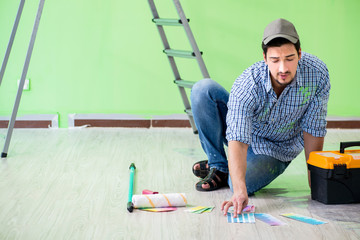 Young man doing home renovation 