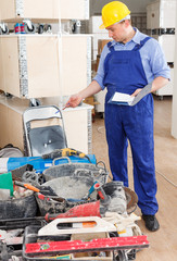 Builder inventorying tools and materials