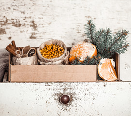 Still life with orange and sea buckthorn
