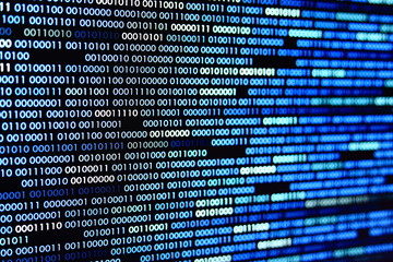 Big overload blockchain data. Blue binary data code background for internet and cyberspace security function. one and zero text on LED moniter screen.