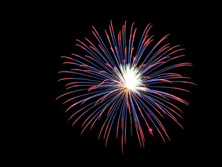 Fireworks , sparklers ,bursting against a black background