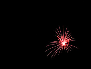 Fireworks , sparklers ,bursting against a black background